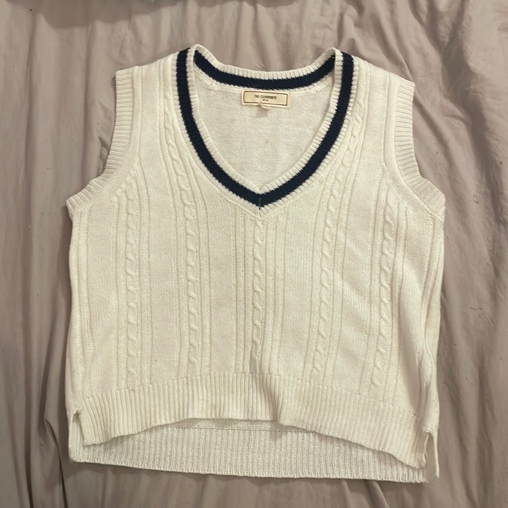 white and blue, no comment vest